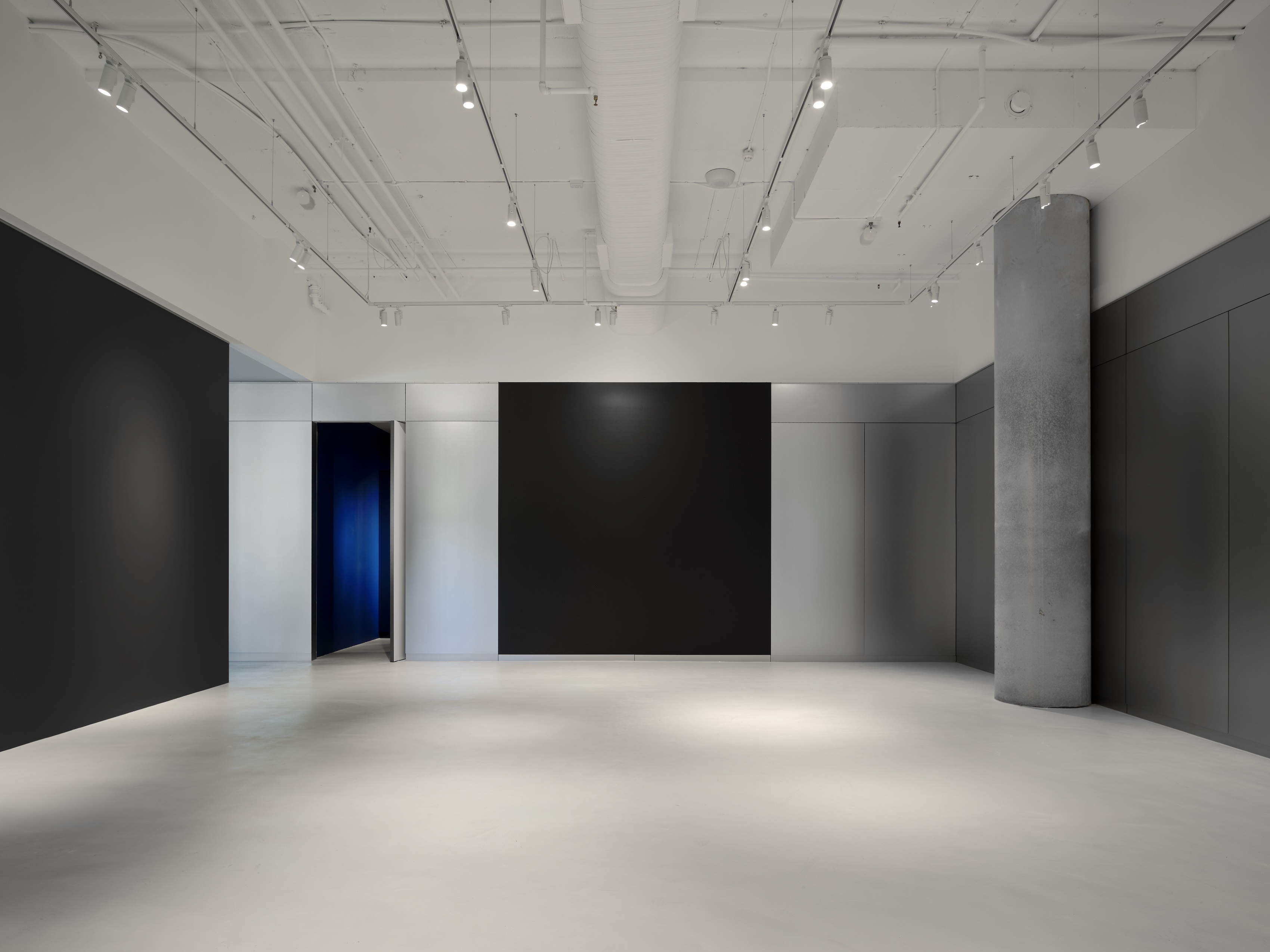 Gallery showroom interior with metallic walls
